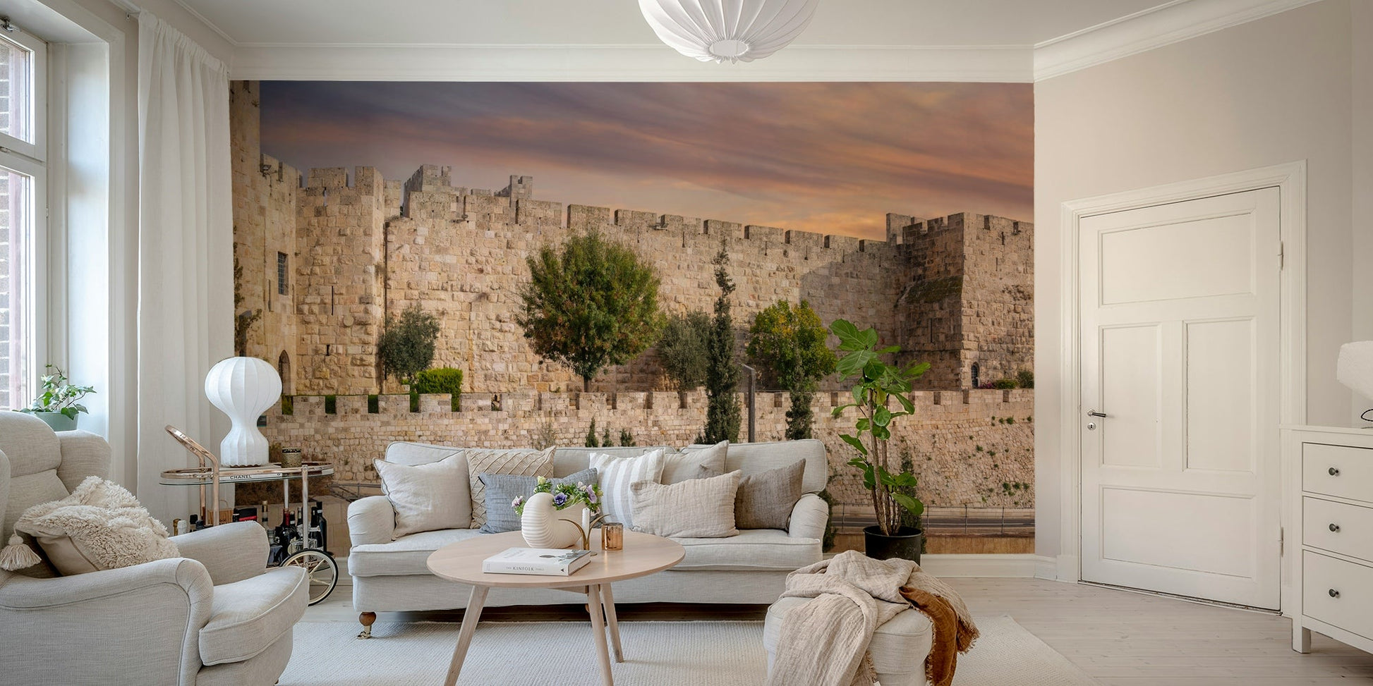A wall mural of the Tower of David and its walls.

