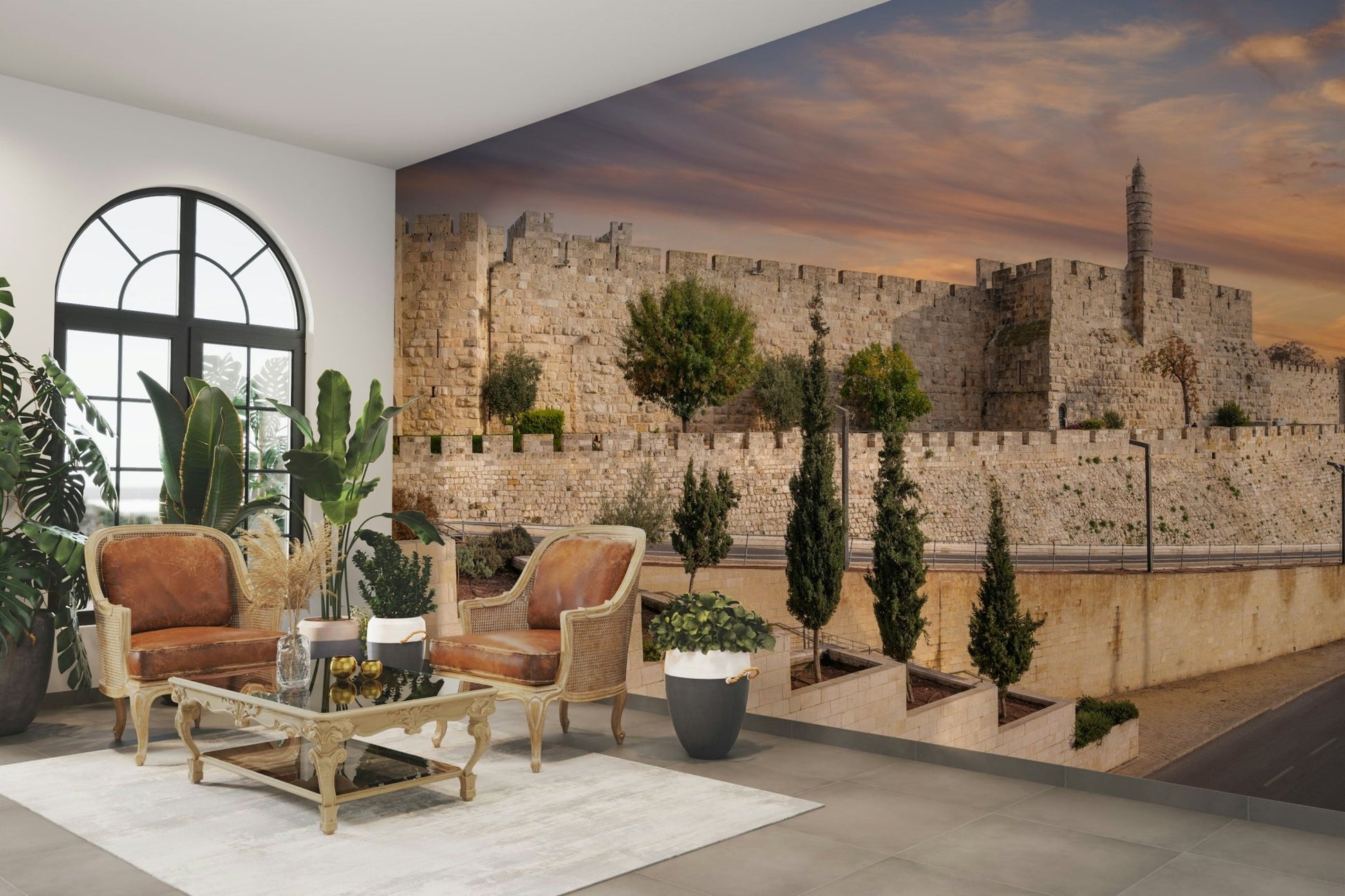 Trees and shrubs are in terraced stone planters in the foreground.


