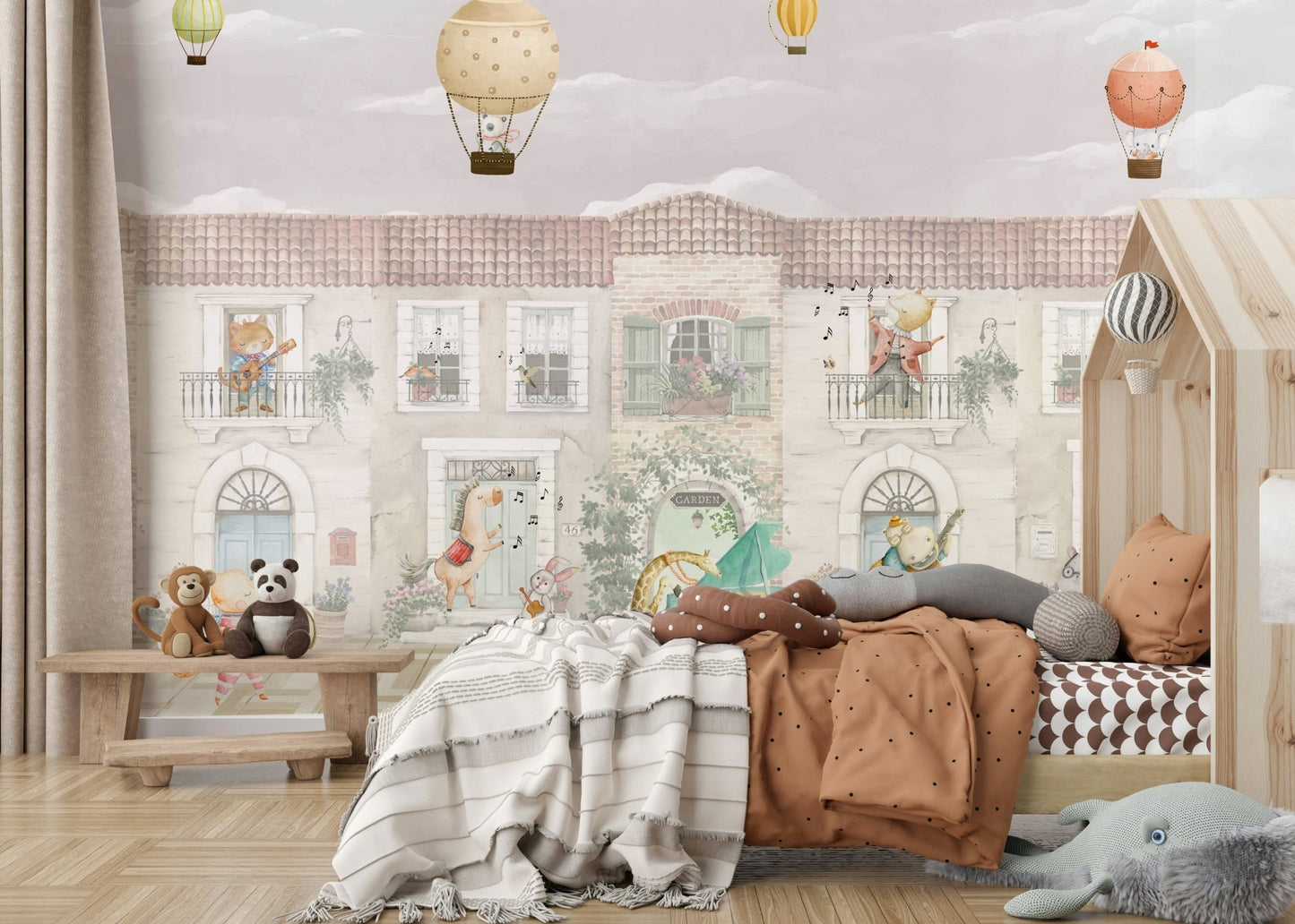 A happy bear is playing a drum.

