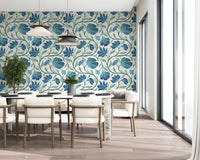 Decorative Indina wallpaper with layered blue petals and trailing green vines