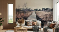 Detailed forest floor and tree wallpaper for a modern accent wall.