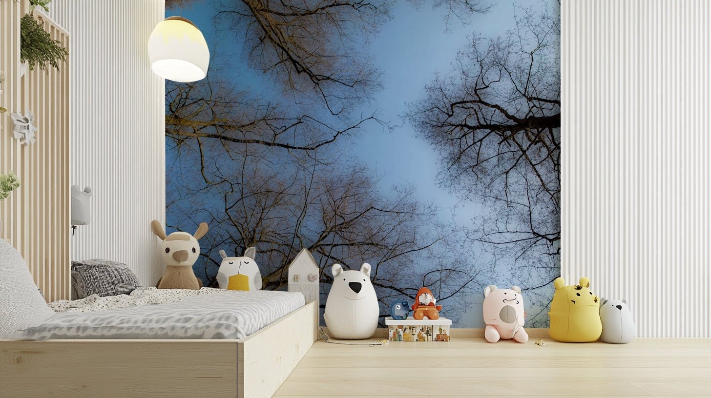 A close-up view of the detailed branches against the blue background.

