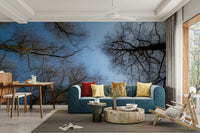The wall mural is installed on a living room feature wall.

