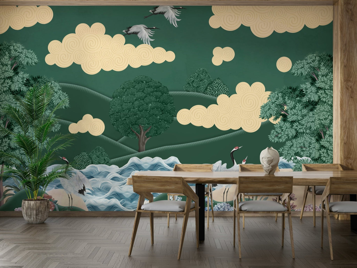 The cranes are standing in a serene pool of water.

