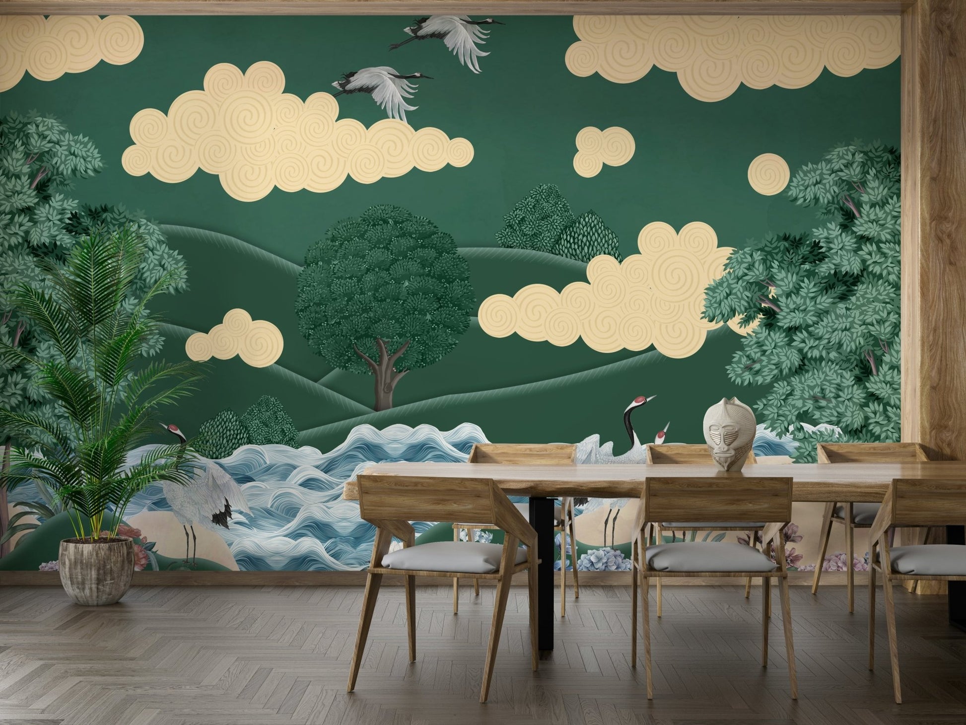 The cranes are standing in a serene pool of water.

