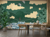 The cranes are standing in a serene pool of water.

