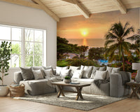 Tropical sunset wallpaper with palm silhouettes


