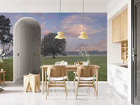 A light-filled dining space framed with Tranquil Sunrise Field Wall Mural in the background, GD8872