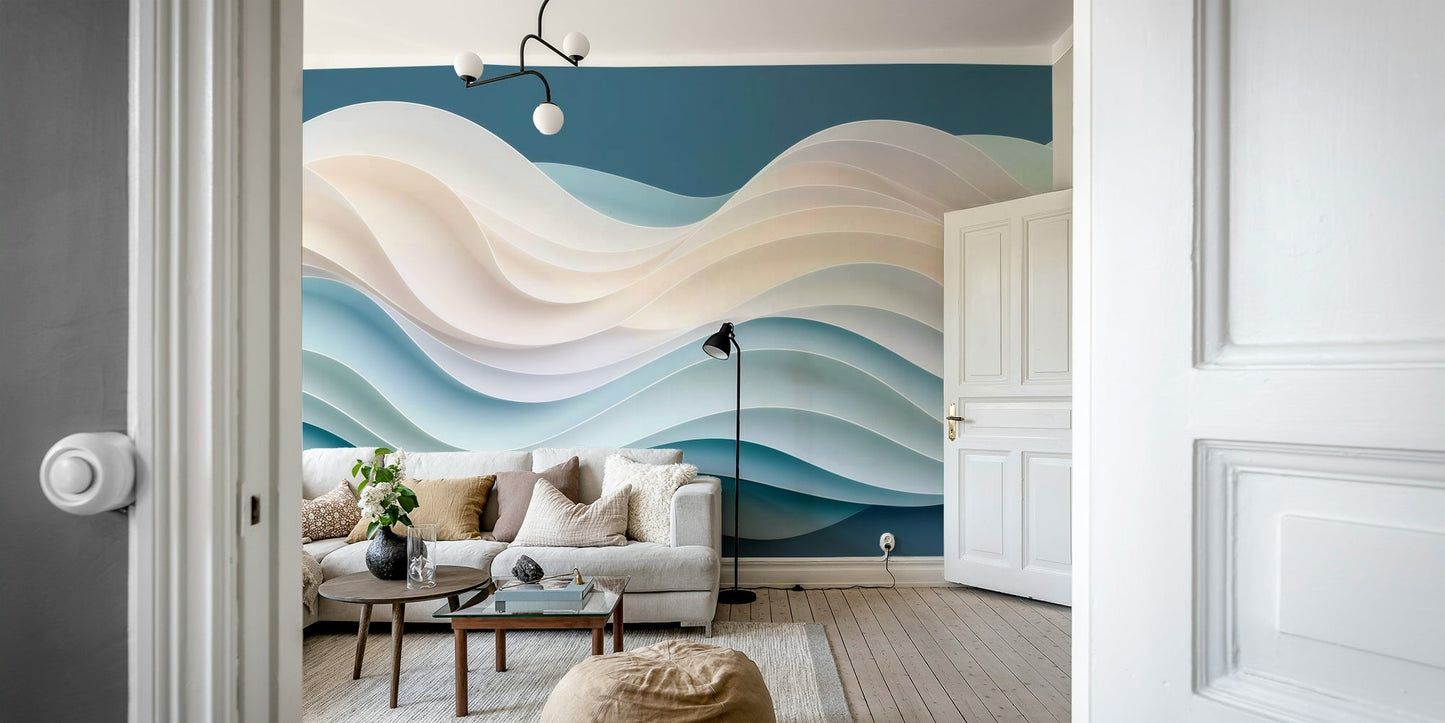 The image shows gentle blue waves rolling onto a sandy beach.

