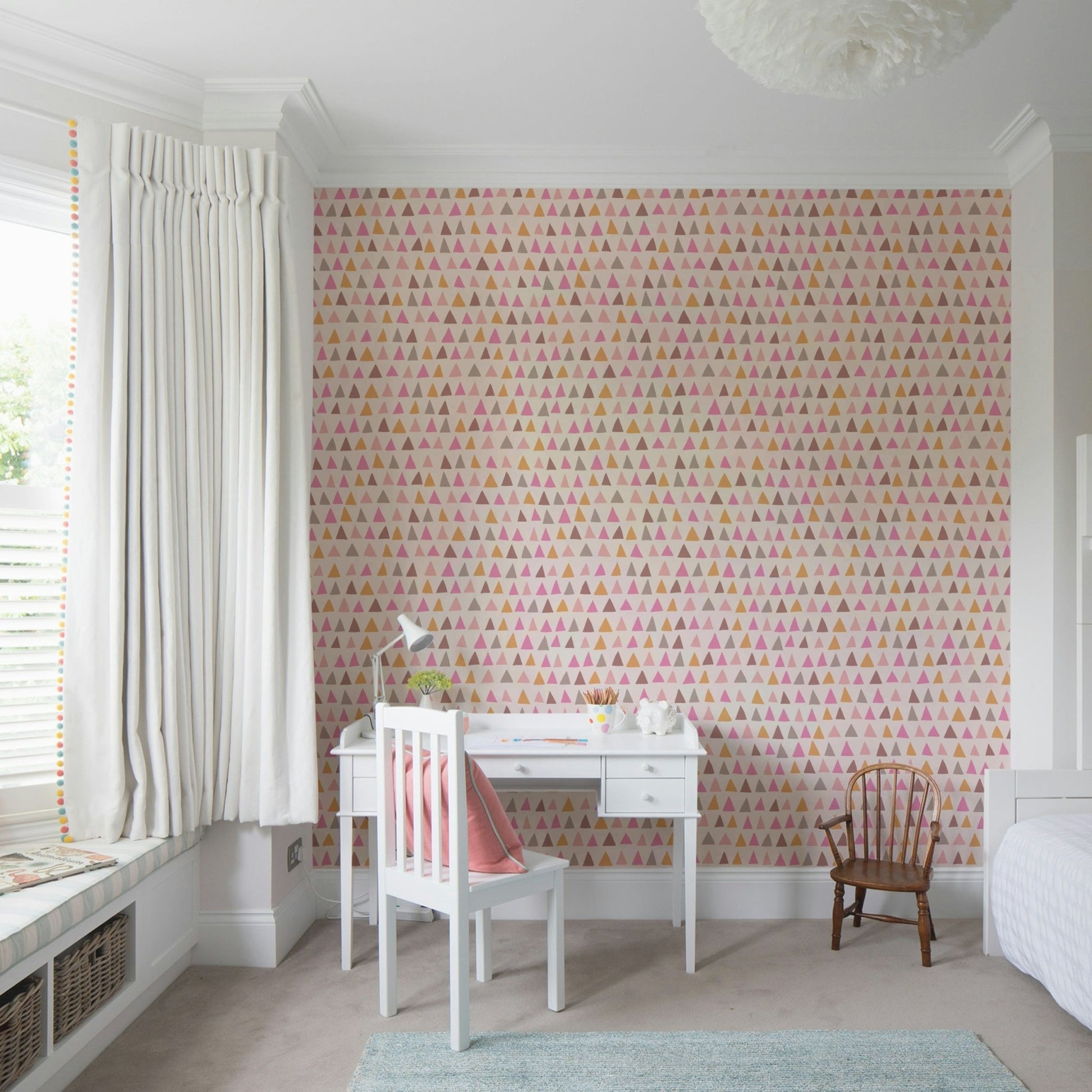 Colorful triangle wall design in pink palette

