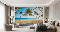 Tropical beach scene wall mural with palm trees.