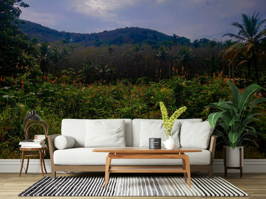 Tropical canopy wall mural in a modern living room setting.