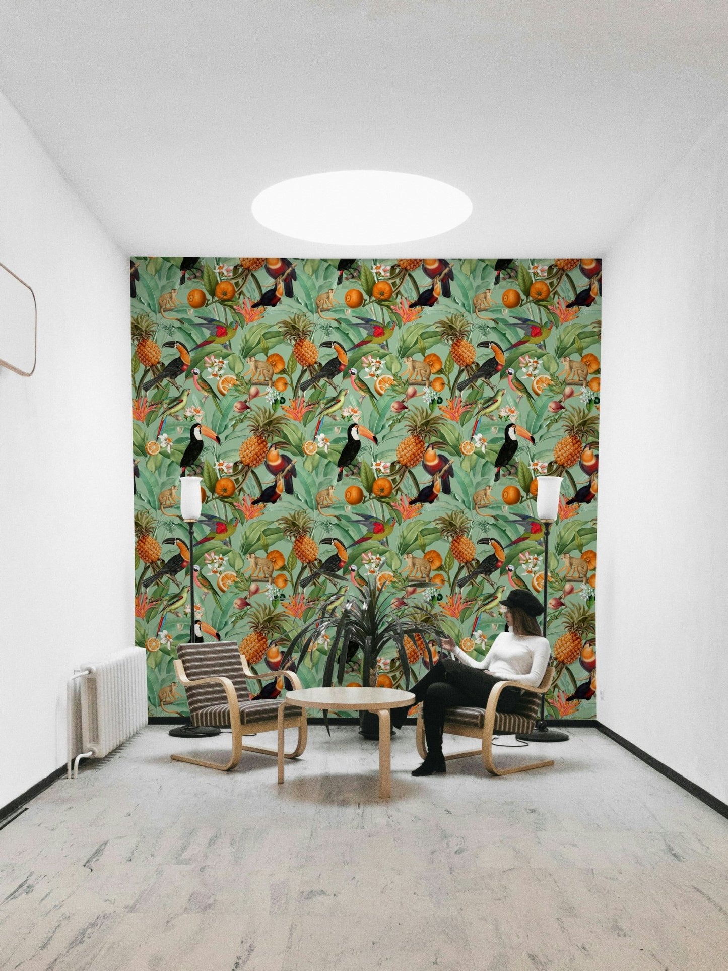 Bold tropical design wallpaper featuring large leafy patterns.

