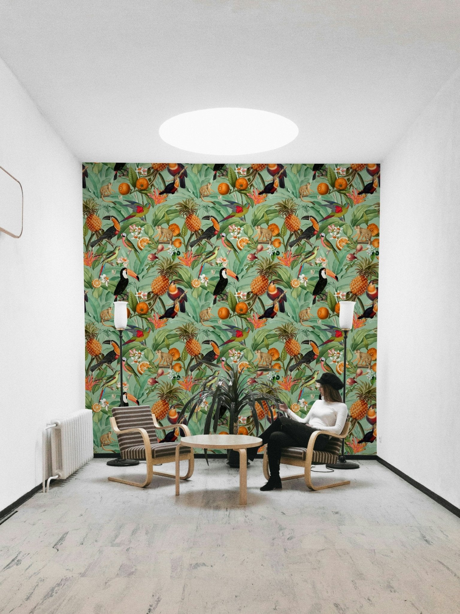 Bold tropical design wallpaper featuring large leafy patterns.

