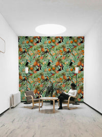 Bold tropical design wallpaper featuring large leafy patterns.

