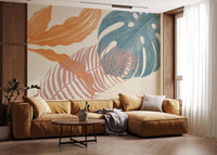 Calm botanical tones bring Tropical Leaves Muted wall mural into an living room