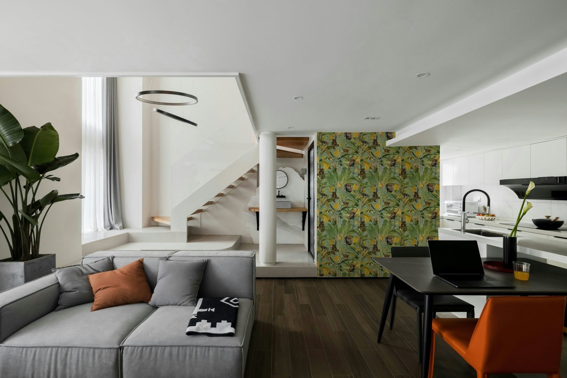 Tropical monkey business wallpaper with vibrant plants.

