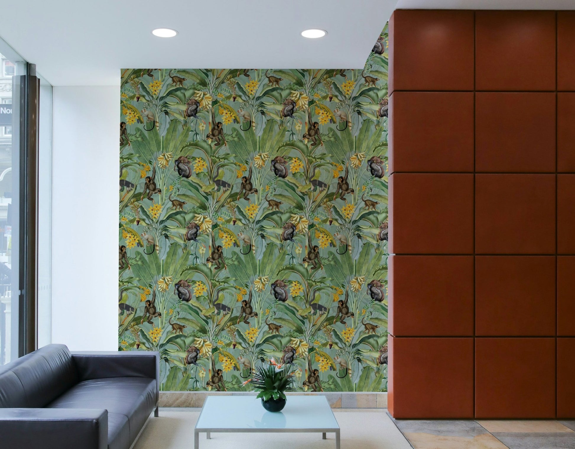 Jungle-themed wallpaper featuring playful monkeys.

