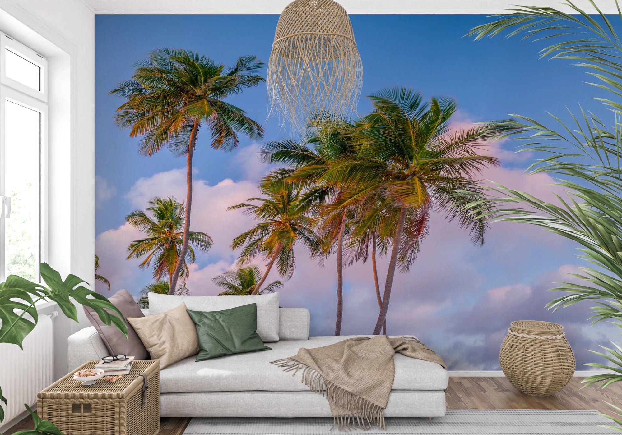 Living room with Tropical Palms Evening Wall Mural behind a white sofa and woven accents, GD8865