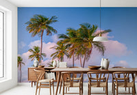 Dining area set with Tropical Palms Evening Wall Mural and a calm tropical sky scene