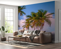 Living room styled with Tropical Palms Evening Wall Mural beside large open windows