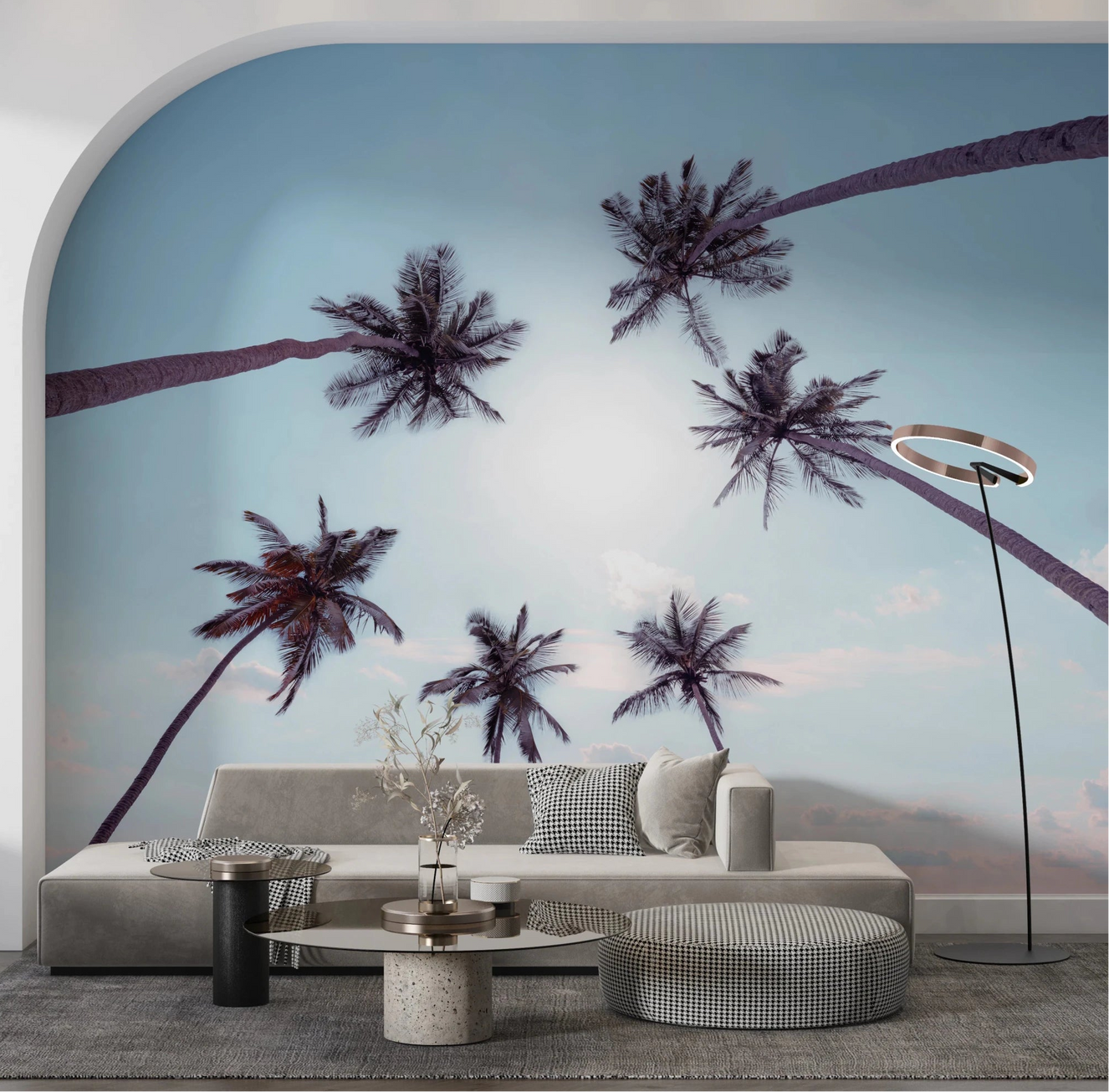 Living room with Tropical Palms Sky View Wall Mural behind a green velvet sofa