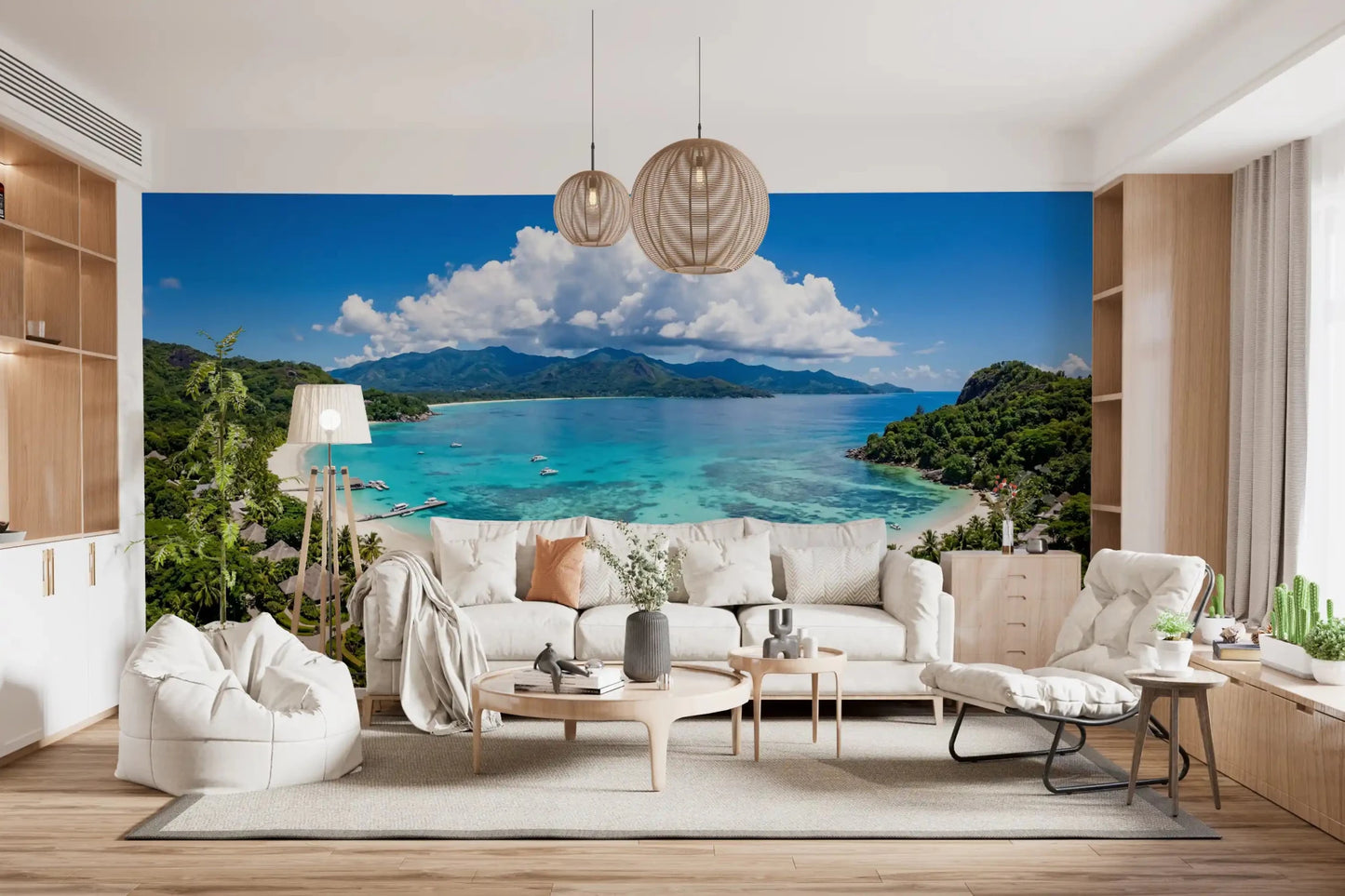 Bright lounge featuring Tropical Paradise View Wall Mural above a white sofa