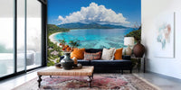 Tropical Paradise View Wall Mural above a bed in a bedroom with a bold rug