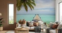 Vibrant blue water wallpaper with a rustic wooden pier and foliage., GD7681