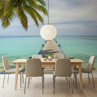 Tropical pier wall mural showing a sunny coastline and white sand beach., GD7681