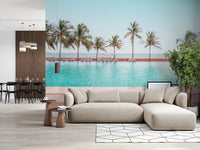 Refreshing aqua pool wallpaper with white umbrellas and sandy tones.