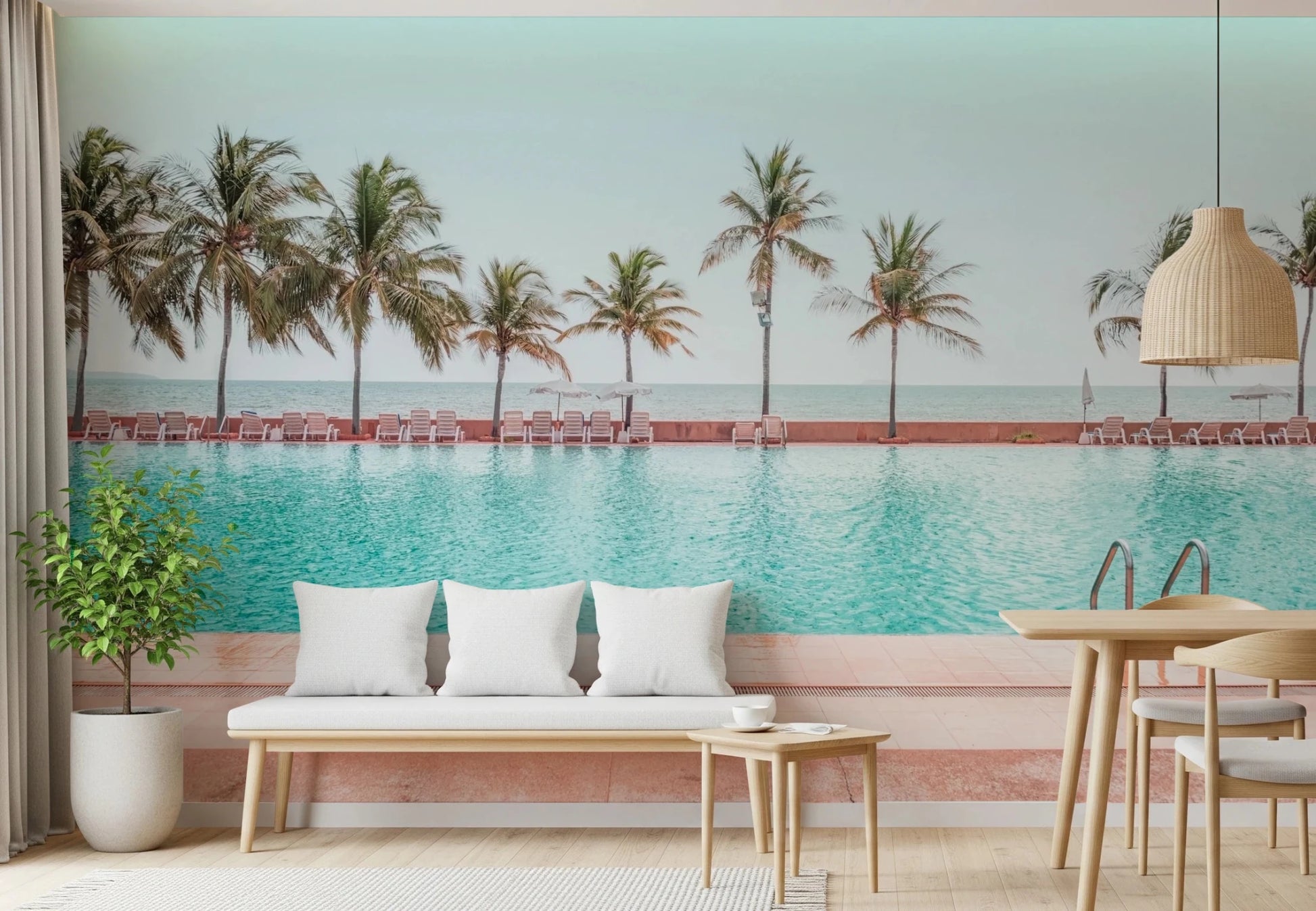 Nature inspired wall mural depicting a quiet seaside hotel deck with palms.
