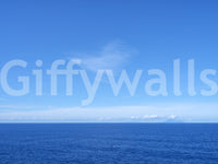 Open horizon in Turquoise Blue Sea Wall Mural with calm waves and distant land ahead, GD8863