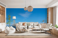Soft Living room interior with Turquoise Blue Sea Wall Mural behind a bed and pendant lighting, GD8863