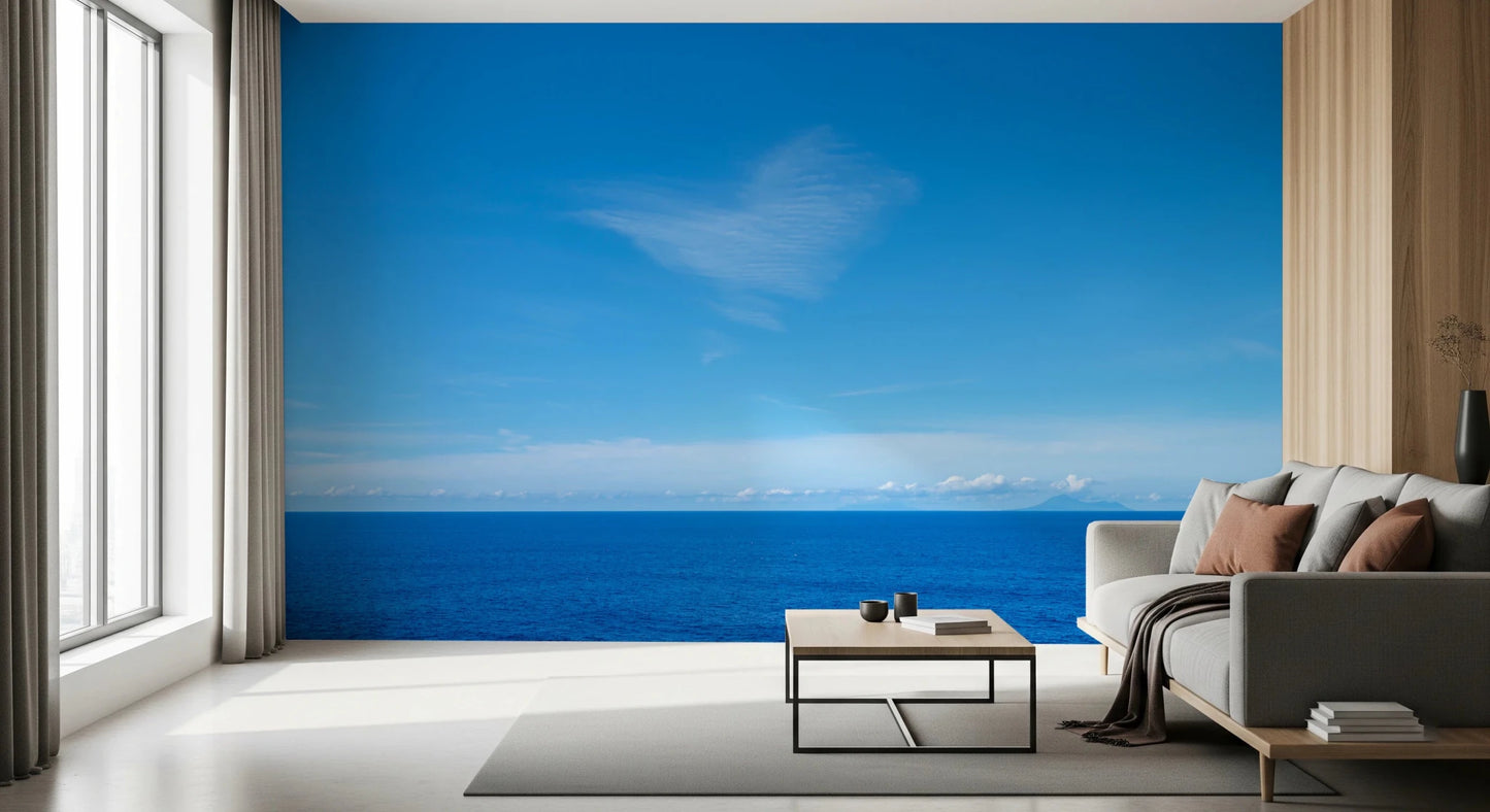Contemporary lounge with Turquoise Blue Sea Wall Mural beside a dark sofa and wide window, GD8863