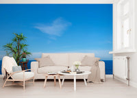 Minimal Hallway area showing Turquoise Blue Sea Wall Mural behind white chairs and a plant, GD8863