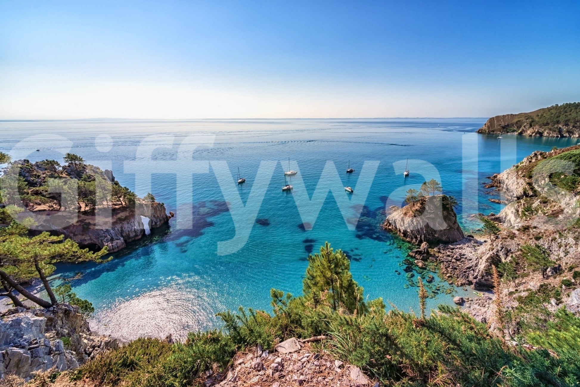 Turquoise cove escape wall mural with rocks for lobby décor