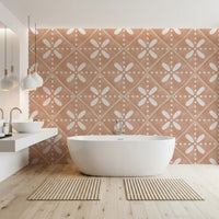 A cozy bathroom feels finished beside this terracotta bloom tile wallpaper.⁠GD9589