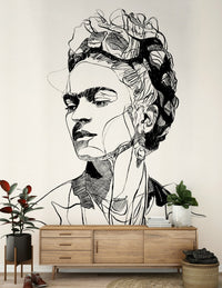 Minimal lounge interior featuring Unbroken portrait wall mural in matte black tones