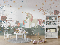 A few fluffy, white clouds are scattered across the sky.

