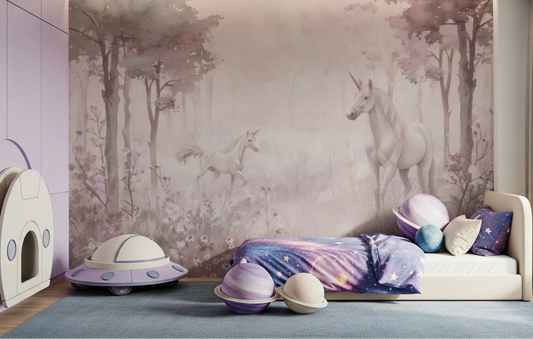 Floor cushions and toys sit beneath Unicorns in a Magical Dreamy Forest Pink Wall Mural