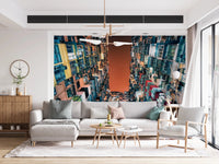 Architectural city wall mural with a moody sunset orange sky