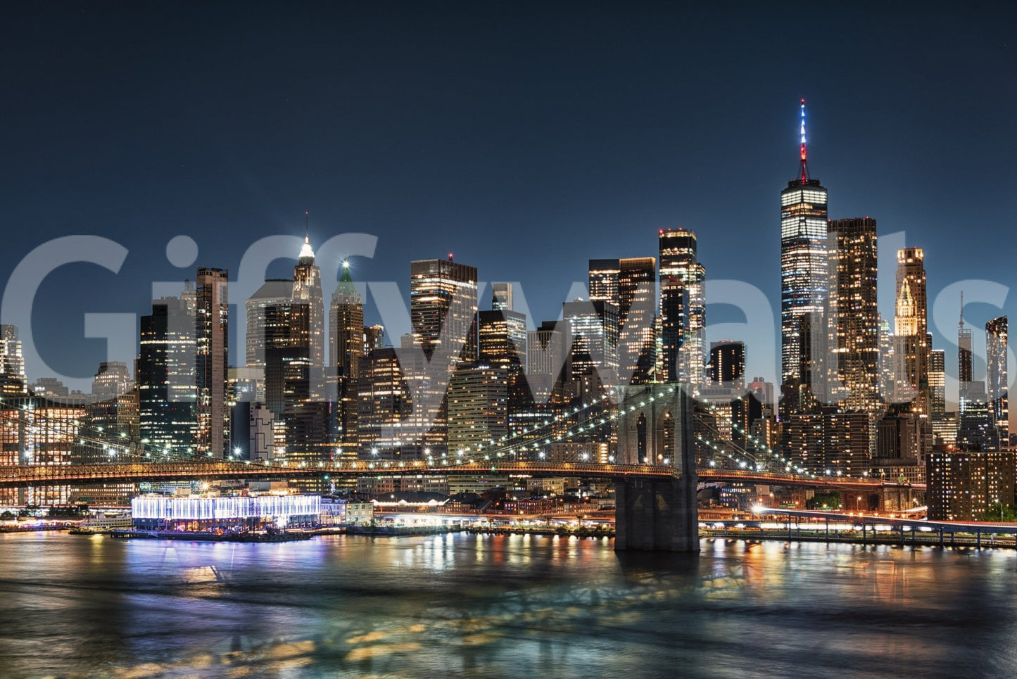Urban Nightscape wall mural with lit building facades for a guest suite.