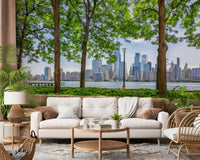 Tall trees over city horizon wallpaper for walls