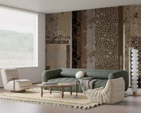 The lounge takes on layered earthy texture from Urban Patina Collage abstract wall mural.GD9599