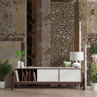 At every column, Urban Patina Collage wall mural mixes pebble fields and splatter washes.GD9599
