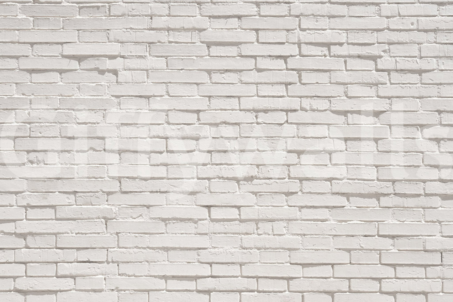 Corner of a hallway dramatically brightened by the Urban White wallpaper for walls.