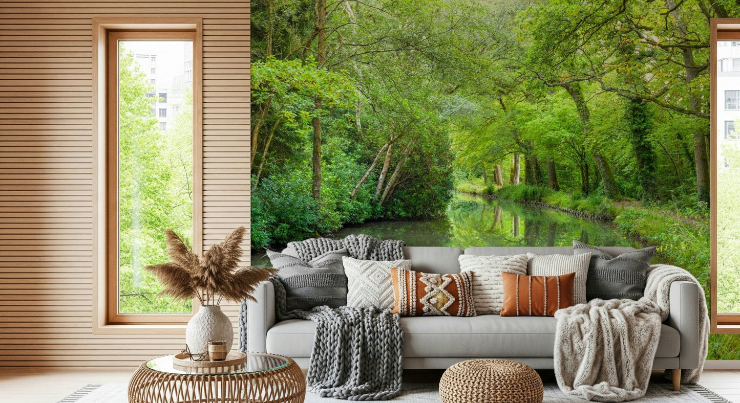 Light filtering Verdant Stream Escape Wall Mural through trees.