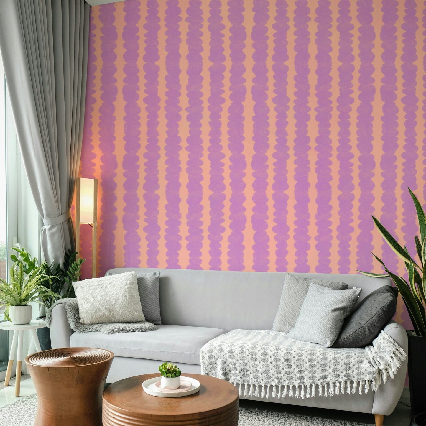 Soft gradient peach and lilac wall design

