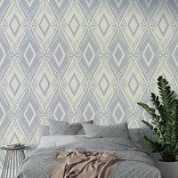 An angled shot of a wall with rhombus wallpaper

